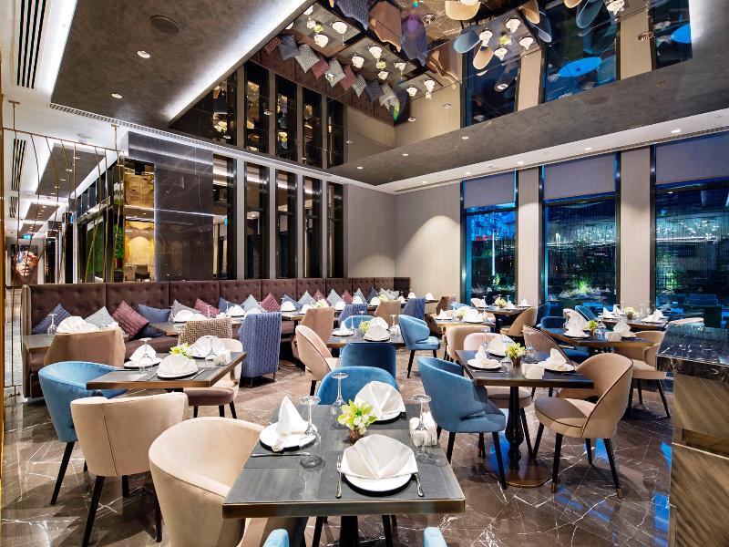 โรงแรมดับเบิล ทรี บาย ฮิลตัน อิสตันบูล ปิยาเลปาซา ภายนอก รูปภาพ The interior of the restaurant